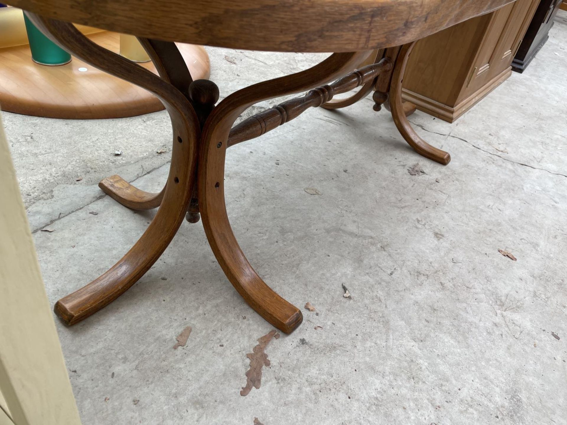 A MODERN COFFEE TABLE WITH SPLIT CANE TOP, ON BENTWOOD LEGS - Image 3 of 3