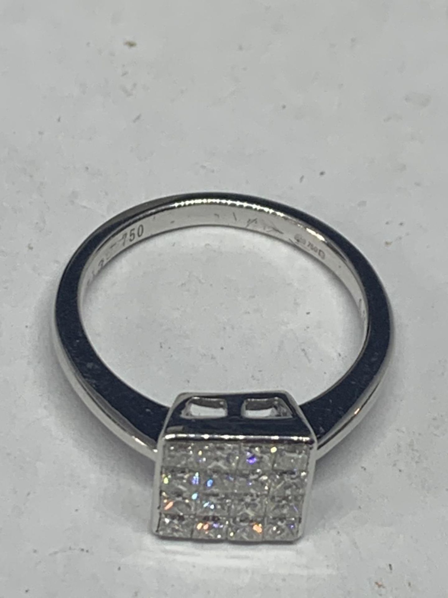 AN 18 CARAT WHITE GOLD RING WITH SIXTEEN DIAMONDS SET IN A SQUARE GROSS WIEGHT 3.9 GRAMS SIZE L/M - Bild 4 aus 5