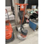 AN ELECTRIC FLOOR POLISHER