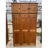 A MODERN 3 DOOR WARDROBE WITH 3 DOOR TOP 50"WIDE