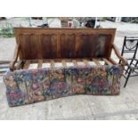A VICTORIAN FIVE PANEL SETTLE 72 INCHES WIDE
