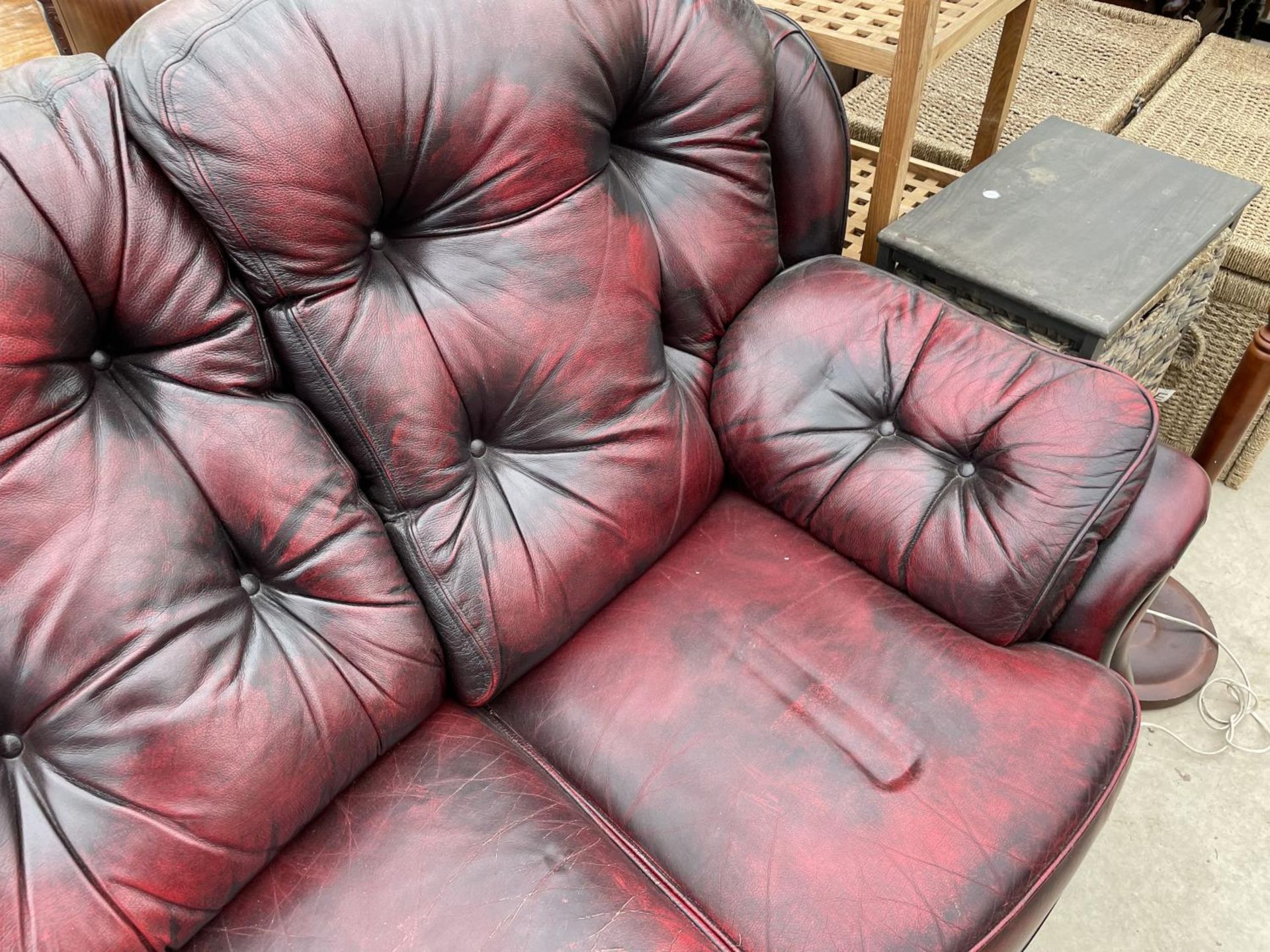 AN OXBLOOD BUTTON-BACK THREE SEATER SETTEE - Image 3 of 5