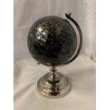 A BLACK AND CHROME GLOBE