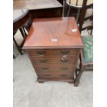 A REPRODUCTION MAHOGANY STEREO CABINET IN THE FORM OF A CHEST OF DRAWERS, 17.5" WIDE