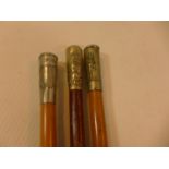 THREE EARLY 20TH CENTURY OFFICERS SWAGGER STICKS , TO INCLUDE THE MACHINE GUN CORPS, LENGTHS FROM