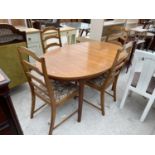 A RETRO TEAK MCINTOSH OVAL EXTENDING DINING TABLE, 59X37" (EXTRA LEAF 17.5") AND FOUR NON ASSOCIATED
