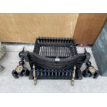 A CAST IRON FIRE GRATE WITH MATCHING FRONT AND PAIR OF FIRE DOGS TO ALSO INCLUDE A FURTHER CAST IRON