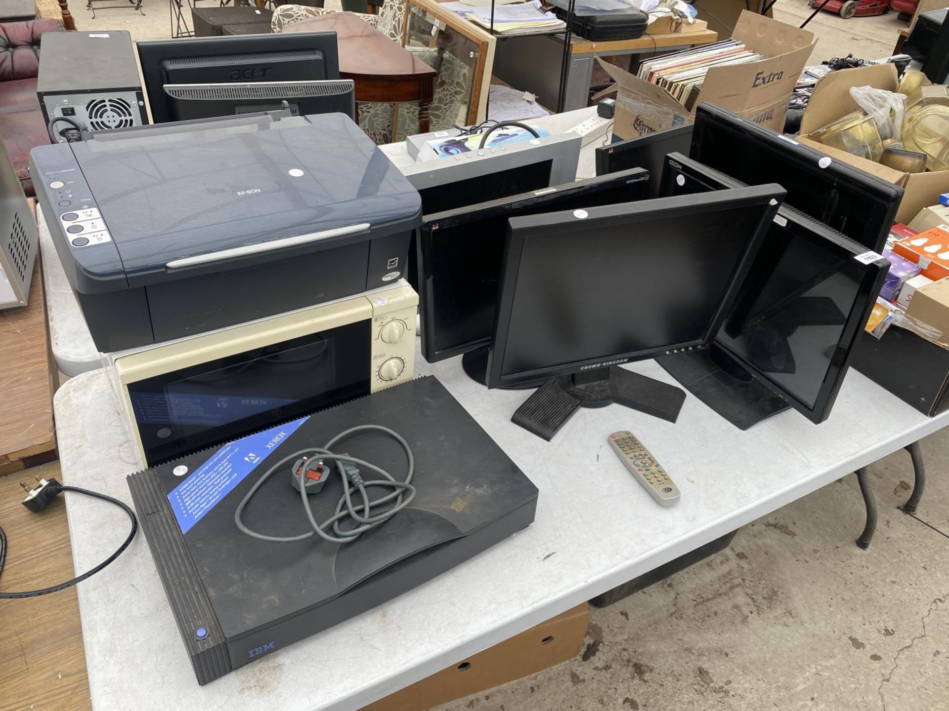 A GROUP OF SIX VARIOUS MONITORS, AN EPSON PRINTER AND A MICROWAVE ETC