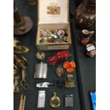 A CIGAR BOX WITH CONTENTS TO INCLUDE LIGHTERS AND A DRINKS FLASK