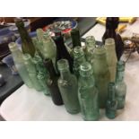 A COLLECTION OF VINTAGE BOTTLES MAINLY GREEN GLASS