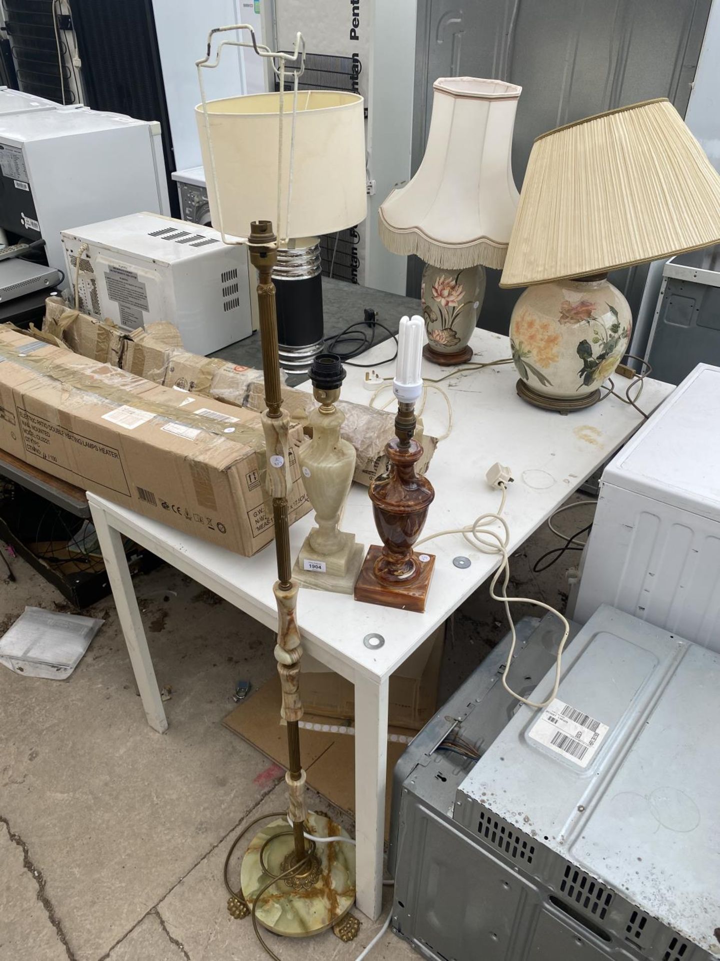 TWO DECORATIVE TABLE LAMPS AND A BRASS AND ONYX STANDARD LAMP