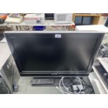 A 26" SONY TELEVISION WITH REMOTE CONTROL