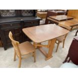 A 20TH CENTURY DROP-LEAF KITCHEN TABLE AND TWO CHAIRS