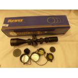 A BOXED HAWKE SIDEWINDER 4-12X52 TELESCOPIC SIGHT AND MOUNTS