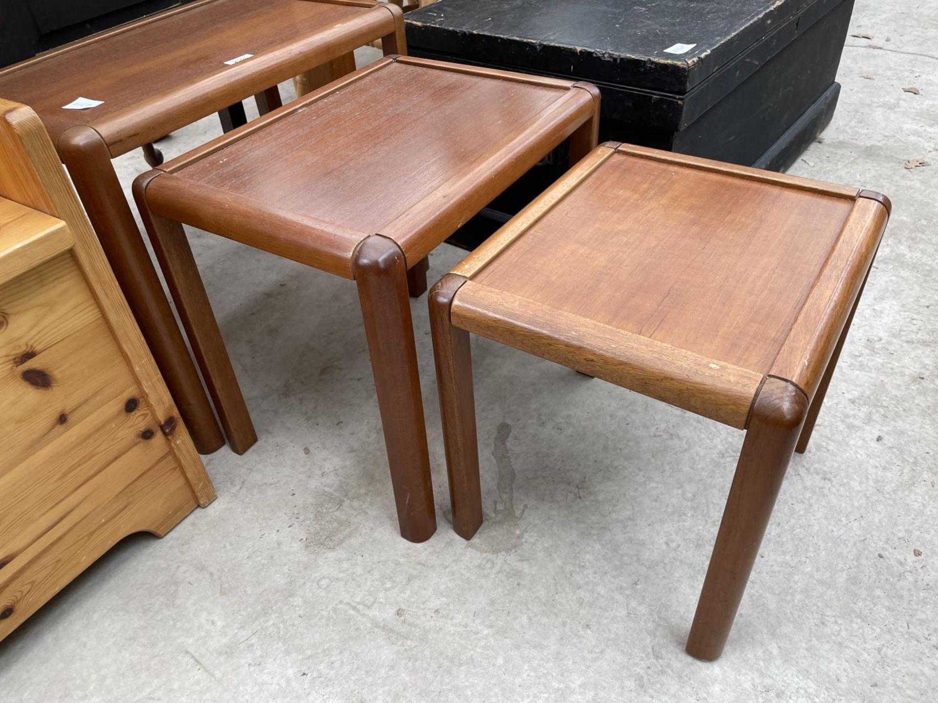 A NEST OF THREE TEAK TABLES - Image 3 of 3