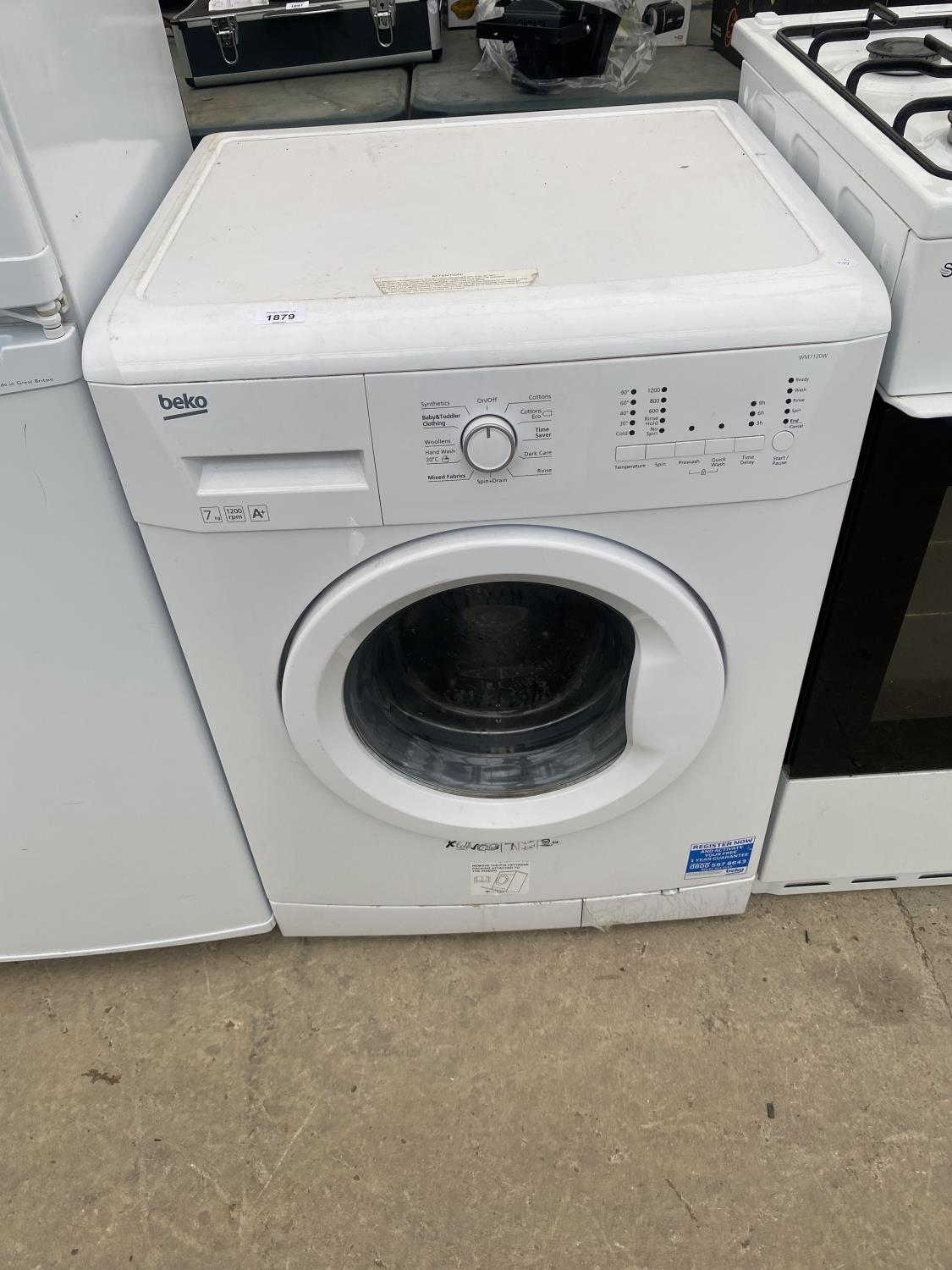 A WHITE BEKO 7KG WASHING MACHINE BELIEVED IN WORKING ORDER BUT NO WARRANTY