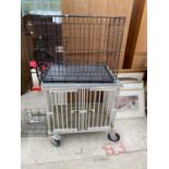 A DOG SHOWING CRATE AND A FURTHER PET CAGE