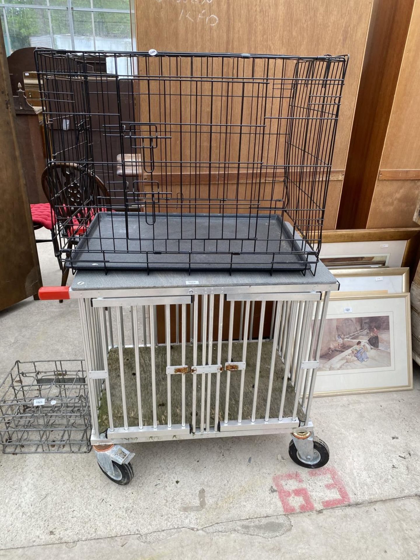 A DOG SHOWING CRATE AND A FURTHER PET CAGE