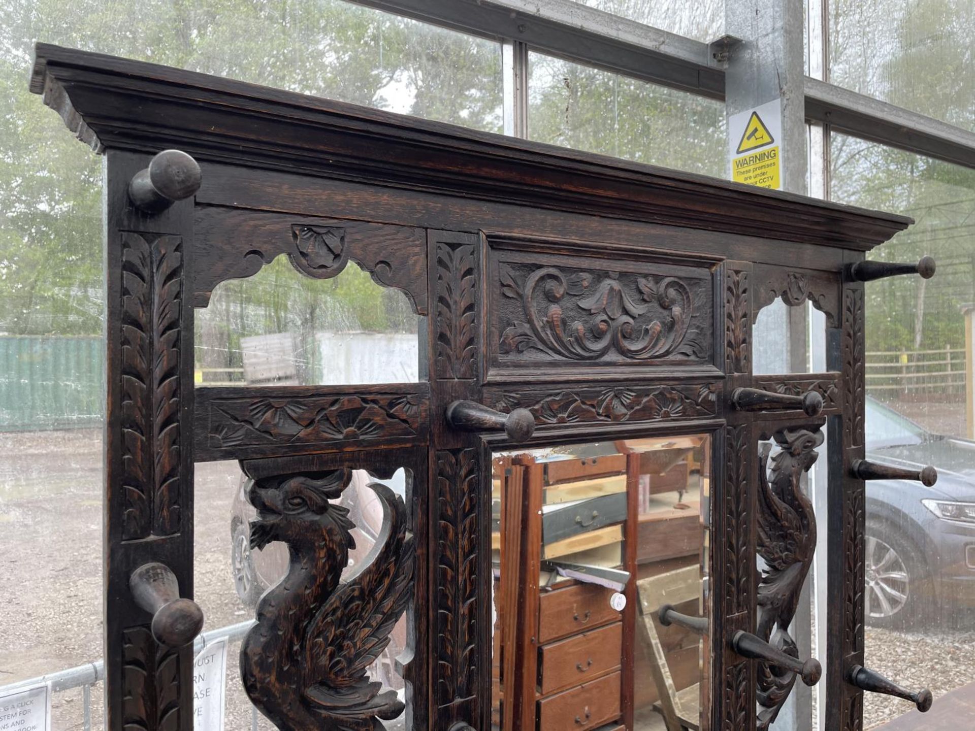 A VICTORIAN HEAVILY CARVED OAK MIRRORED HALL COAT/STICK STAND WITH MIRRORED BACK - 42" WIDE - Image 2 of 6