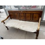 A VICTORIAN PINE SETTLE WITH FIVE PANEL BACK, 71.5" WIDE, ON TURNED FRONT LEGS