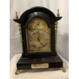 A VICTORIAN EBONISED BRACKET CLOCK WITH SILVERISED DIAL, GILDED DECORATION AND PIERCED SIDE