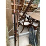 A COLLECTION OF THREE VARIOUS FISHING RODS TO INCLUDE A DAIWA MOONRAKER ETC