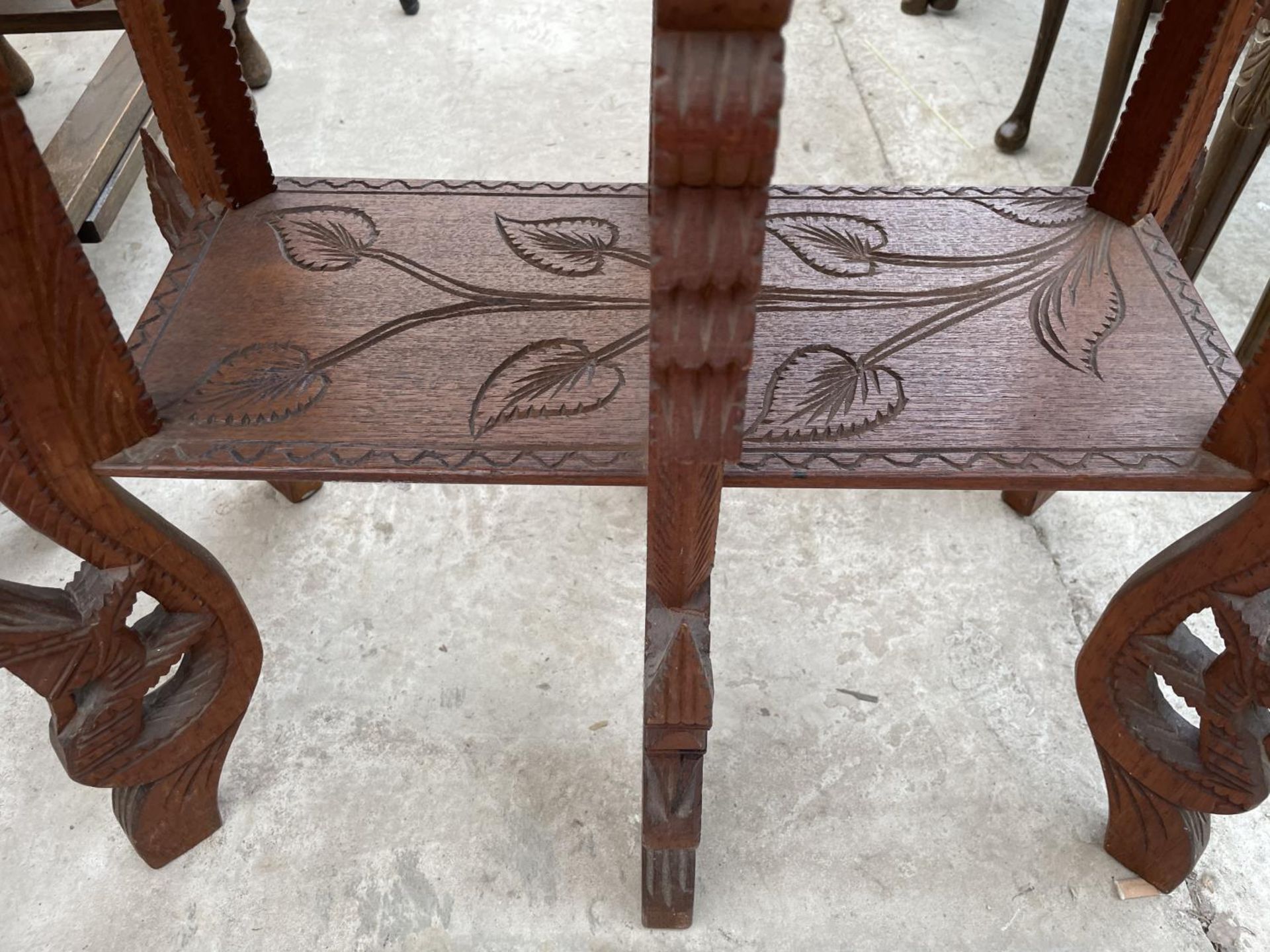 A HEAVILY CARVED ASIAN HARDWOOD TWO TIER OCCASIONAL TABLE, 26X14" - Image 6 of 6