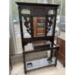 A VICTORIAN HEAVILY CARVED OAK MIRRORED HALL COAT/STICK STAND WITH MIRRORED BACK - 42" WIDE