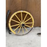 A METAL BANDED WOODEN CART WHEEL (A/F)