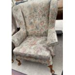 A PARKER KNOLL WINGED CHAIR, P.K. 720/45 MK-3
