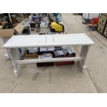 A WHITE PAINTED TABLE
