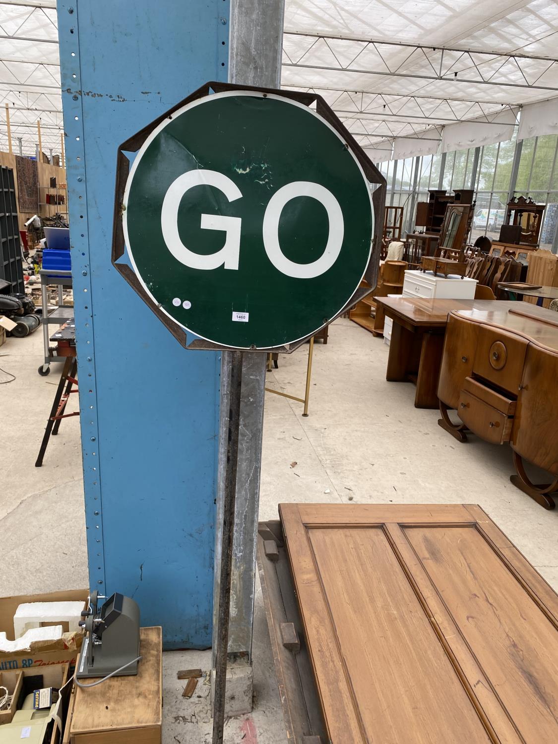 A 'STOP AND GO' ROAD TRAFFIC SIGNAL SIGN