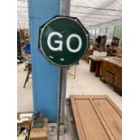 A 'STOP AND GO' ROAD TRAFFIC SIGNAL SIGN