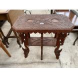 A HEAVILY CARVED ASIAN HARDWOOD TWO TIER OCCASIONAL TABLE, 26X14"