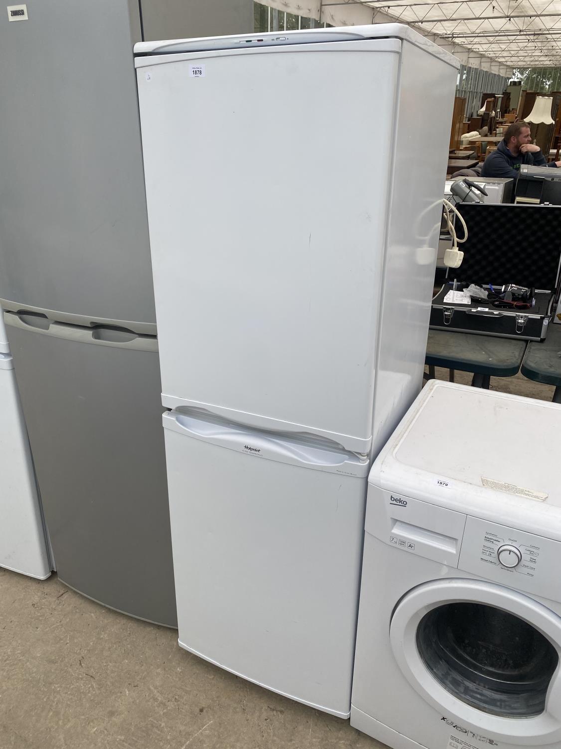 A WHITE HOTPOINT ICED DIAMOND UPRIGHT FRIDGE FREEZER BELIEVED IN WORKING ORDER BUT NO WARRANTY