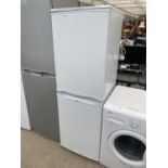 A WHITE HOTPOINT ICED DIAMOND UPRIGHT FRIDGE FREEZER BELIEVED IN WORKING ORDER BUT NO WARRANTY