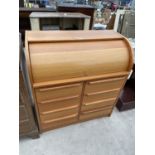 A MODERN CYLINDER TOP DESK ENCLOSING FOUR DRAWERS AND TWO FILING DRAWERS, 35.5" WIDE