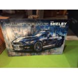 A 'FORD SHELBY GT500 MUSTANG' METAL SIGN