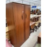 A RETRO TEAK BEEANESE FURNITURE TWO DOOR WARDROBE, 36" WIDE