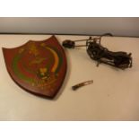 A 48TH GURKHA BRIGADE WOOD PLAQUE DATED HONG KONG 1954/7, KUKRI KORDA KNIFE AND A METAL MOTORBIKE