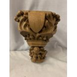 A MEDIEVAL STYLE OAK CARVED CORBEL