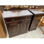 A VICTORIAN STYLE CABINET WITH TWO DOORS, TWO DRAWERS AND RAISED BACK, 32" WIDE, TOGETHER WITH A