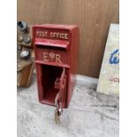 A CAST IRON POST BOX WITH TWO KEYS