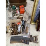 AN ASSORTMENT OF TOOLS TO INCLUDE A BATTERY CHARGER, TROWELS AND A SMALL RECORD WOOD PLANE ETC
