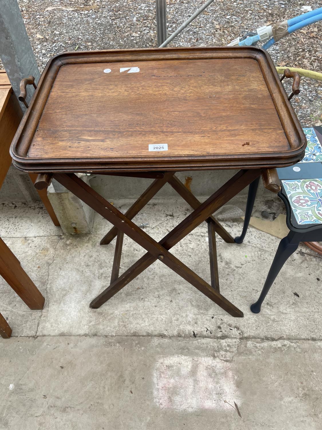 AN EDWARDIAN BUTLERS TRAY ON FOLDING STAND