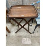 AN EDWARDIAN BUTLERS TRAY ON FOLDING STAND