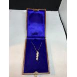 A 14 CARAT GOLD NECKLACE AND PENDANT MADE UP OF 1 CARAT OF DIAMONDS GROSS WEIGHT 3.7 GRAMS CHAIN