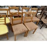 A SET OF FIVE MODERN PINE DINING CHAIRS