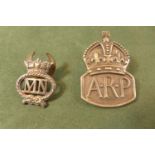 A HALLMARKED SILVER ARP BADGE AND A MERCHANT NAVY ON SERVICE BADGE