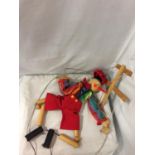 A WOODEN PINOCCHIO PUPPET